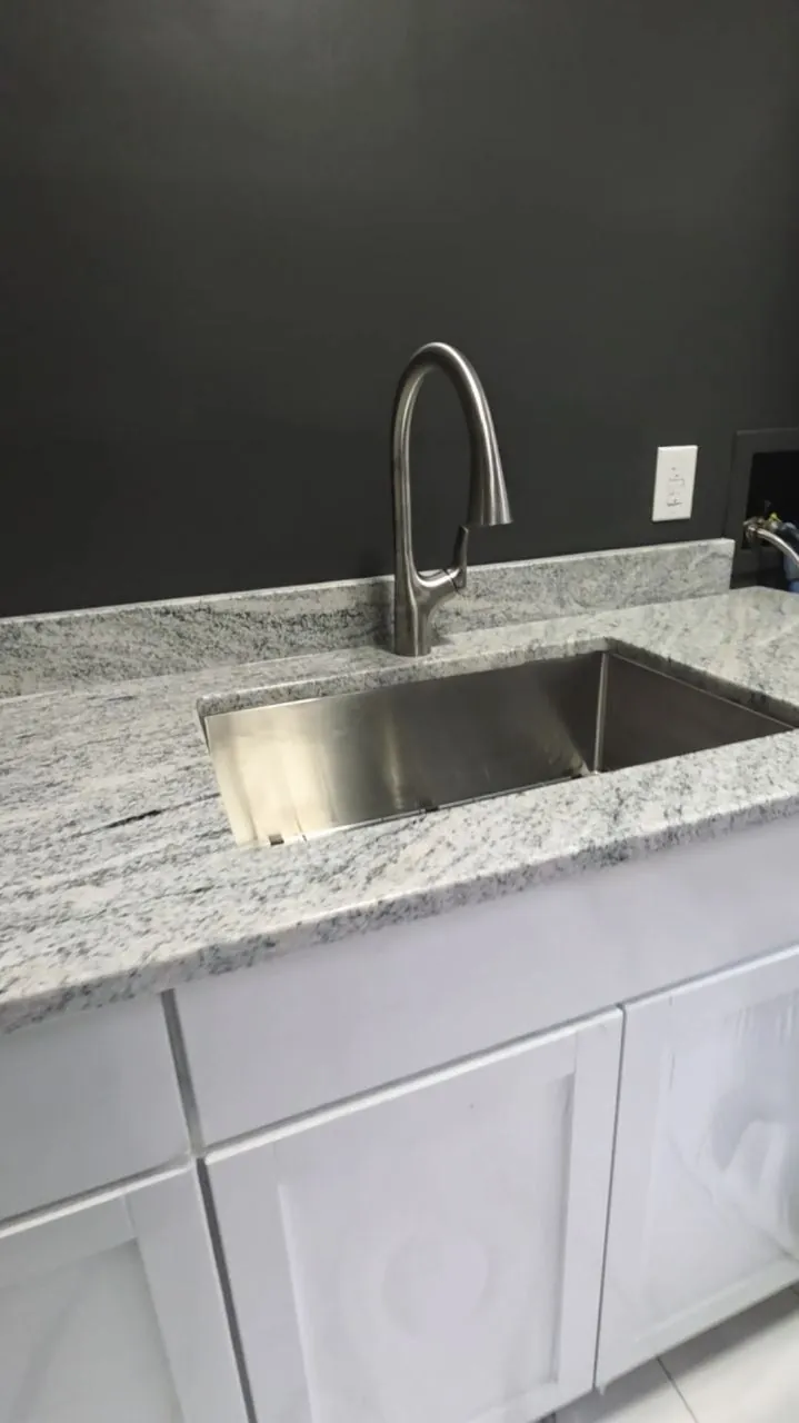 Utility sink and faucet upgrade by Afternoon Plumbing in Westminster MD
